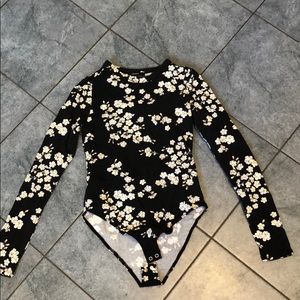 Black long sleeve bodysuit white and yellow floral